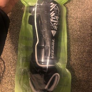 Brand new soccer shin guards with ankle protection. Kids.